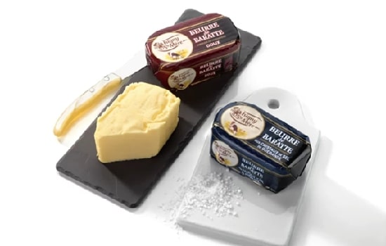 Two butter trays from two different brands