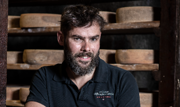 Portrait photo of Mr. Eric Mainbourg, manager of Caves d'Affinage de Savoie.