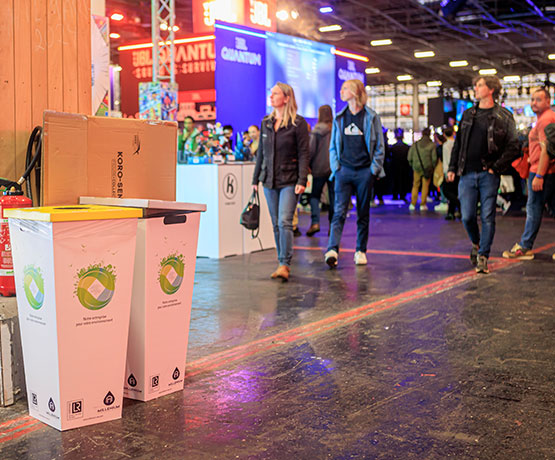 Image of selective sorting bins at a trade fair